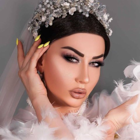 Rəqqasə Fatimə gəlinlik donu geyindi